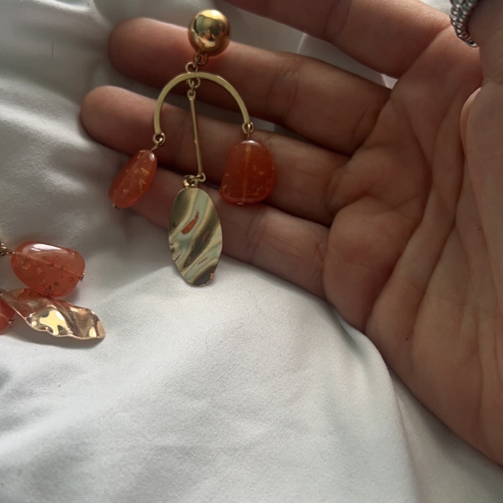 Gold dangling earrings